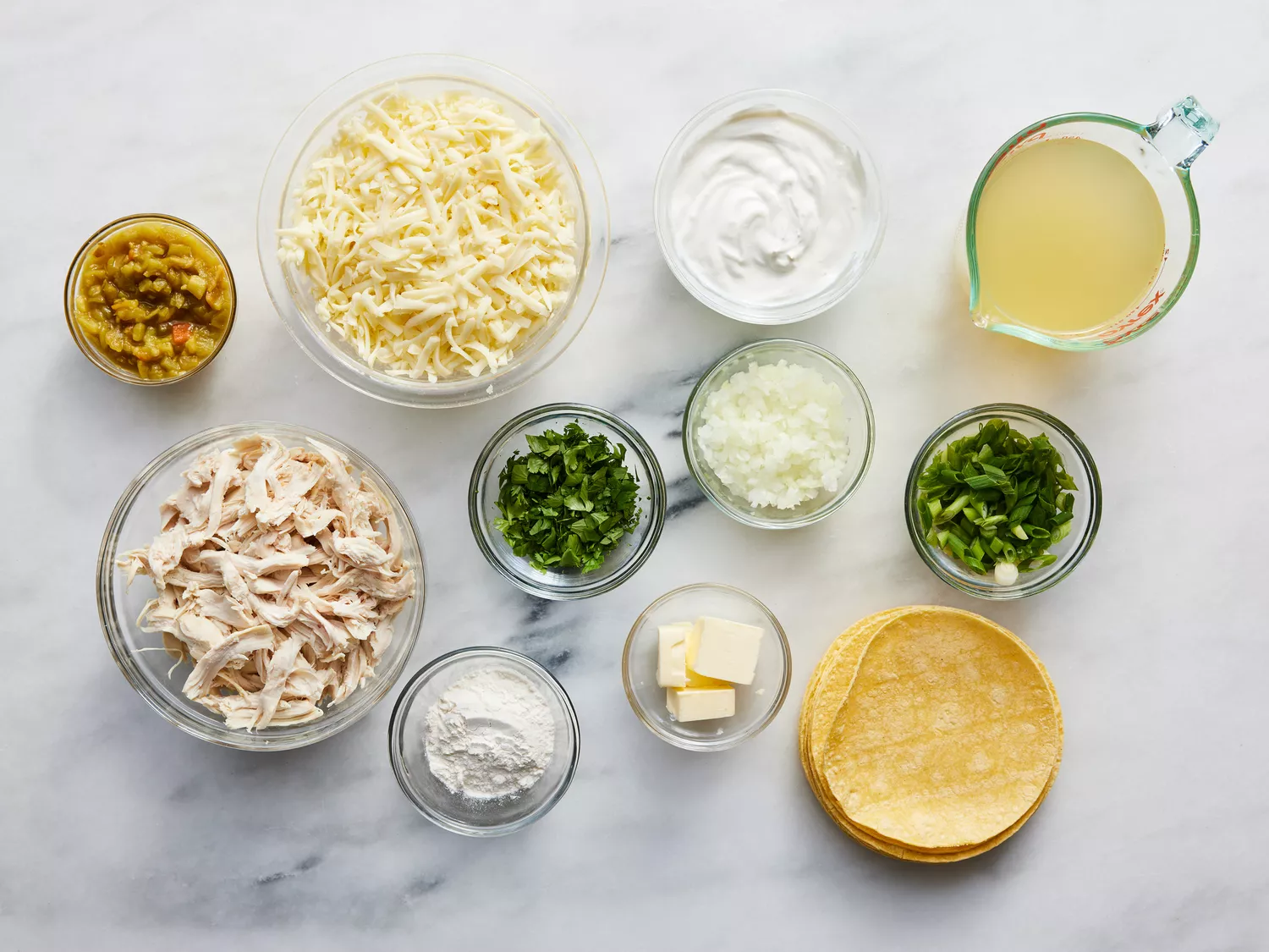 all ingredients gathered to make chicken enchiladas. 