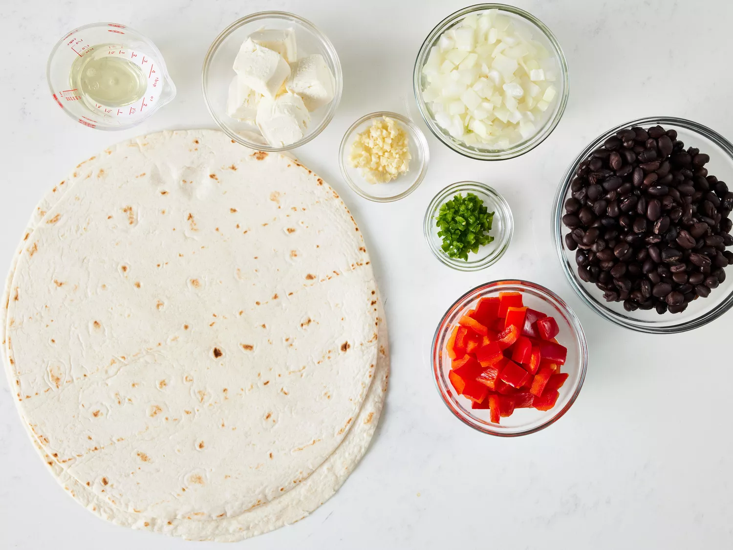 an overhead shot of all ingredients for black bean burritos