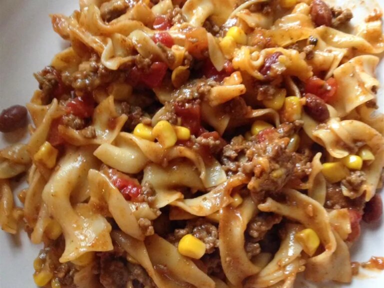 Close up view of a hamburger casserole on a white plate