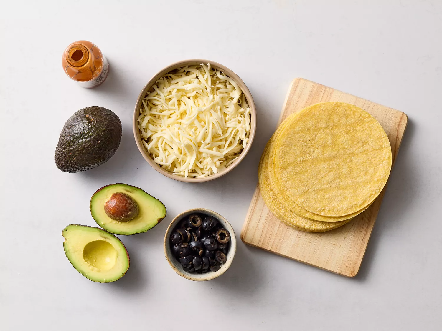 Easy Quesadillas recipe ingredients on a white counter 