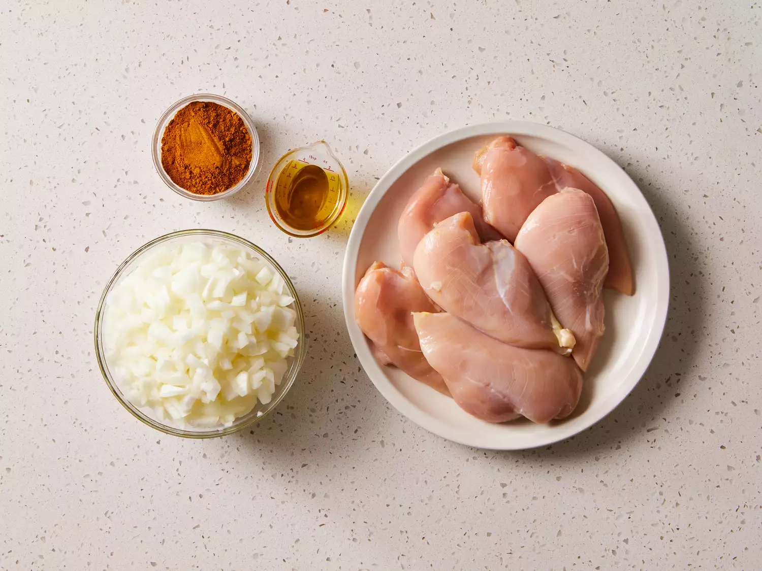 Easy Chicken Curry ingredients on a white counter 