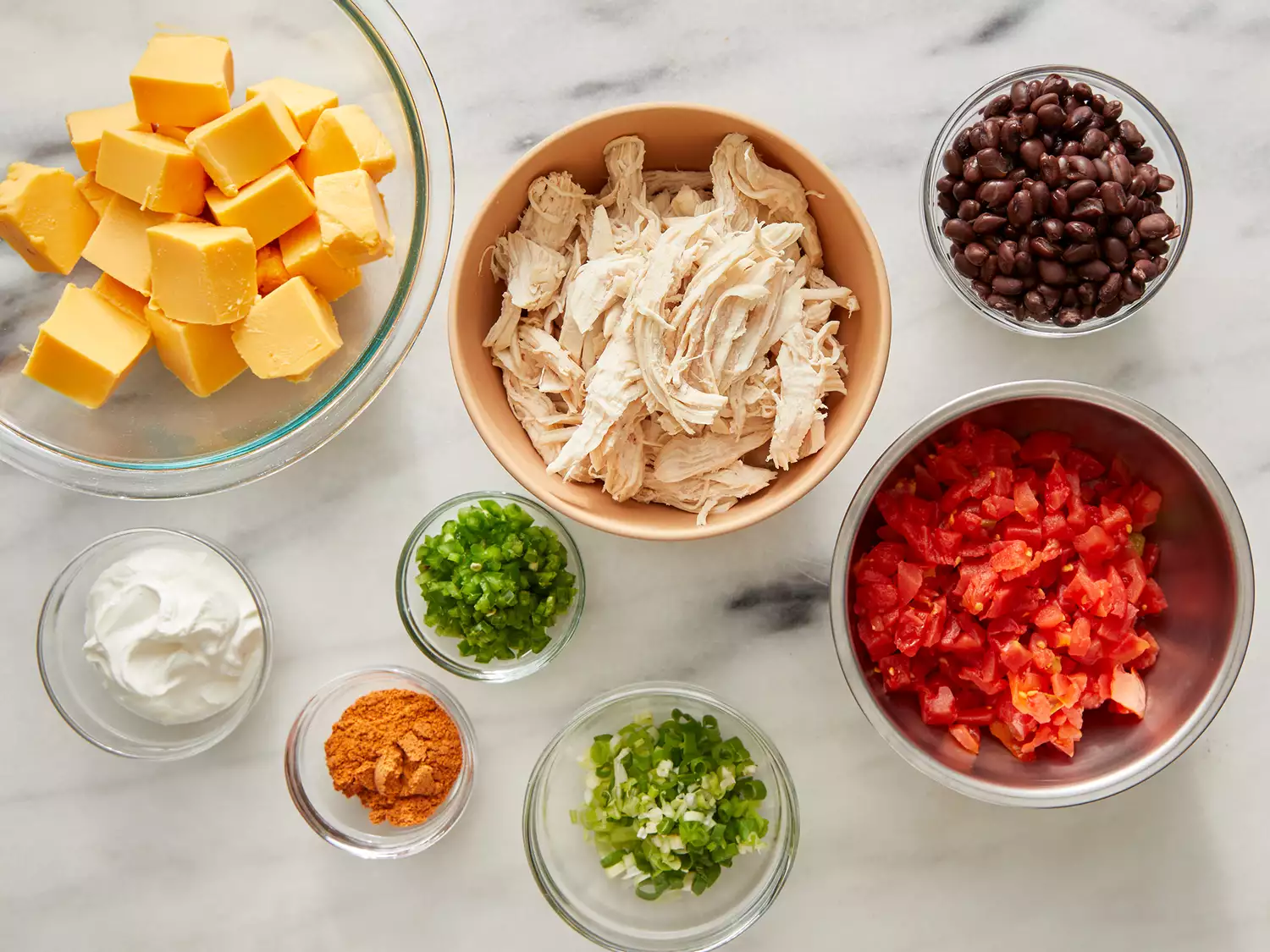 All ingredients gathered to make outrageously warm chicken nacho dip.