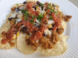 Nachos with lentils, cheese, and salsa