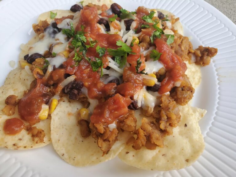 Nachos with lentils, cheese, and salsa