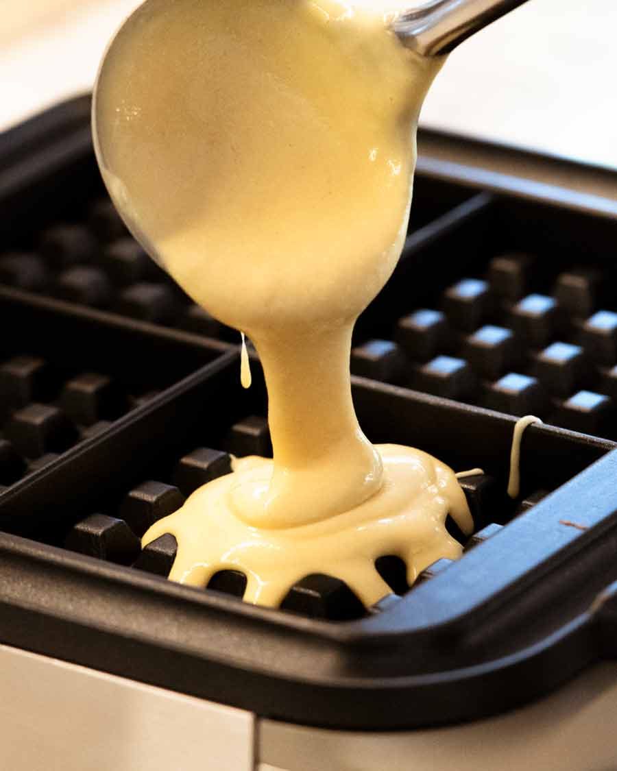 Waffles Recipe Pouring Waffle batter into waffle maker