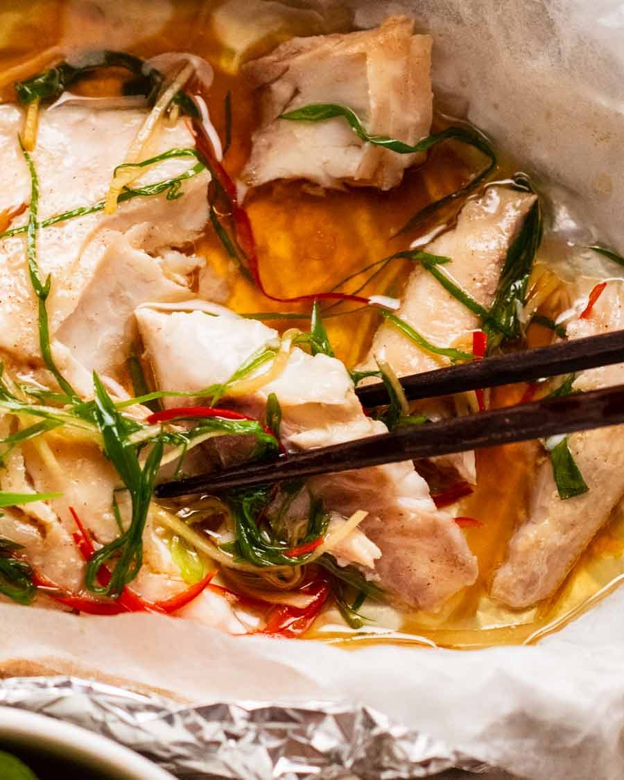 Sizzling Ginger Steamed Fish Recipe Close up photo of eating Sizzling ginger fish