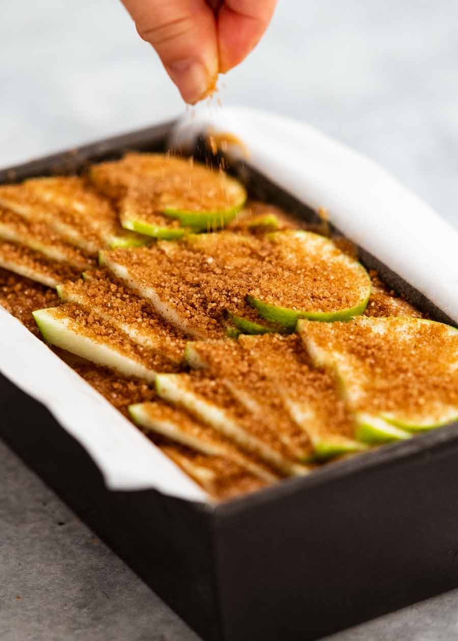Cinnamon Apple Bread Recipe Sprinkling sugar on Cinnamon Apple Bread