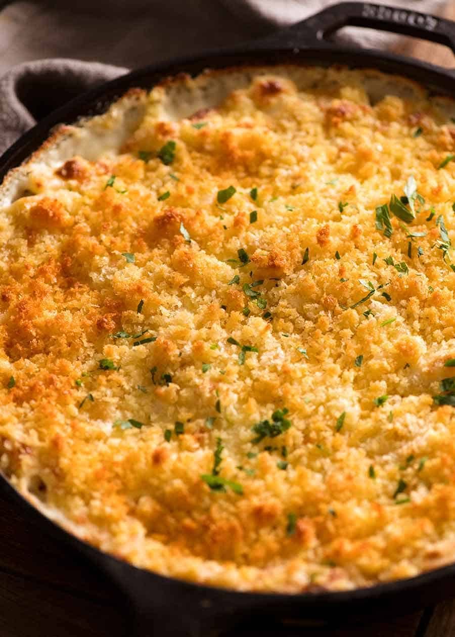 Baked Mac and Cheese Recipe Baked Macaroni Cheese in a black skillet fresh out of the oven