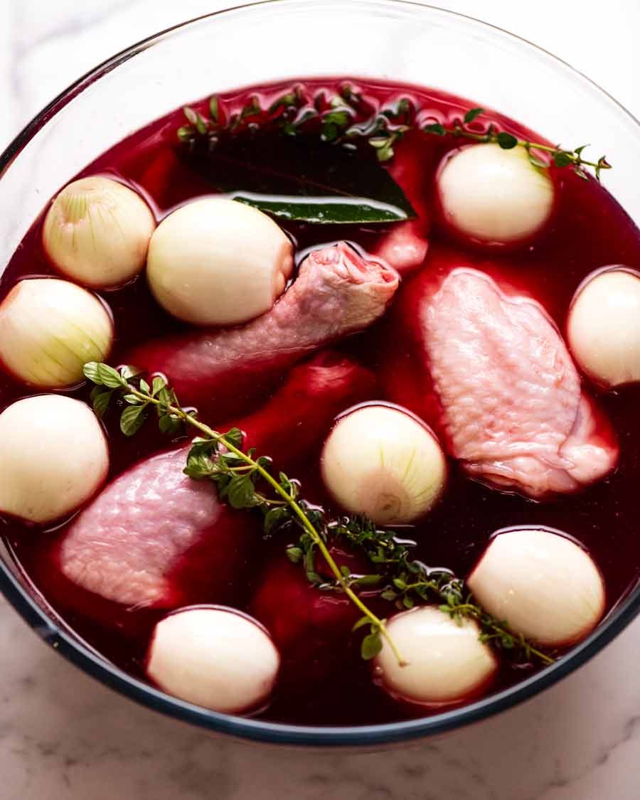 Coq au Vin Recipe Marinating chicken in red wine Pinot Noir for Coq au Vin - French chicken stew