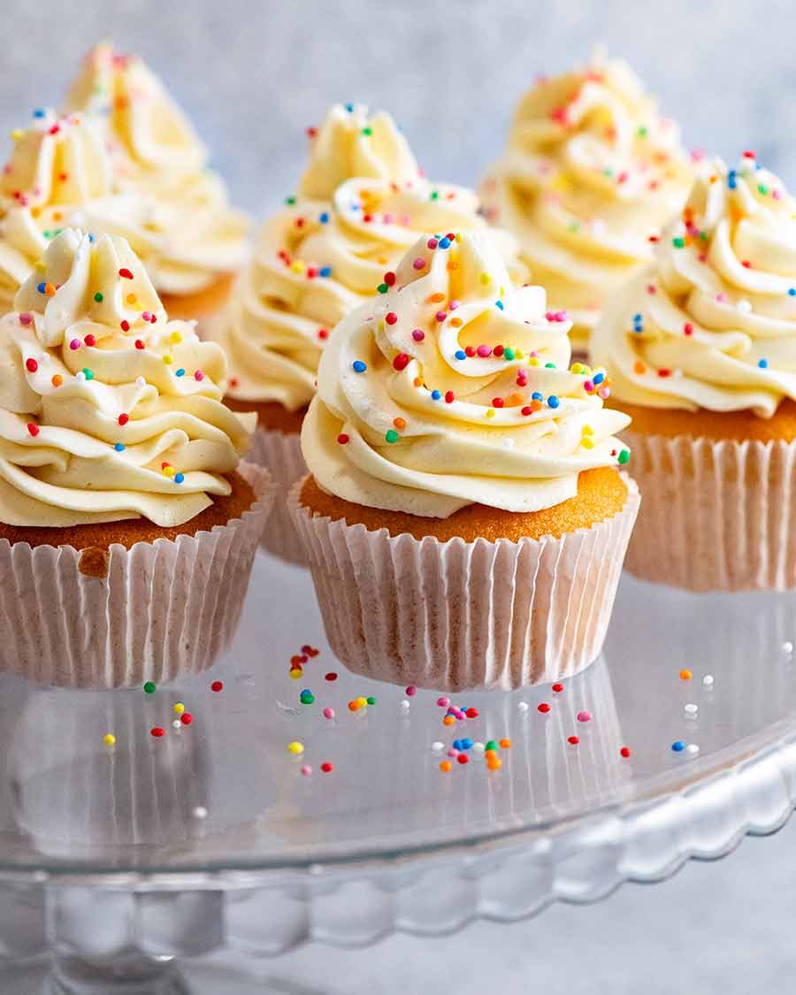 Vanilla Cupcakes (that actually stay moist) Recipe Birthday Vanilla cupcakes with sprinkles, ready to be served
