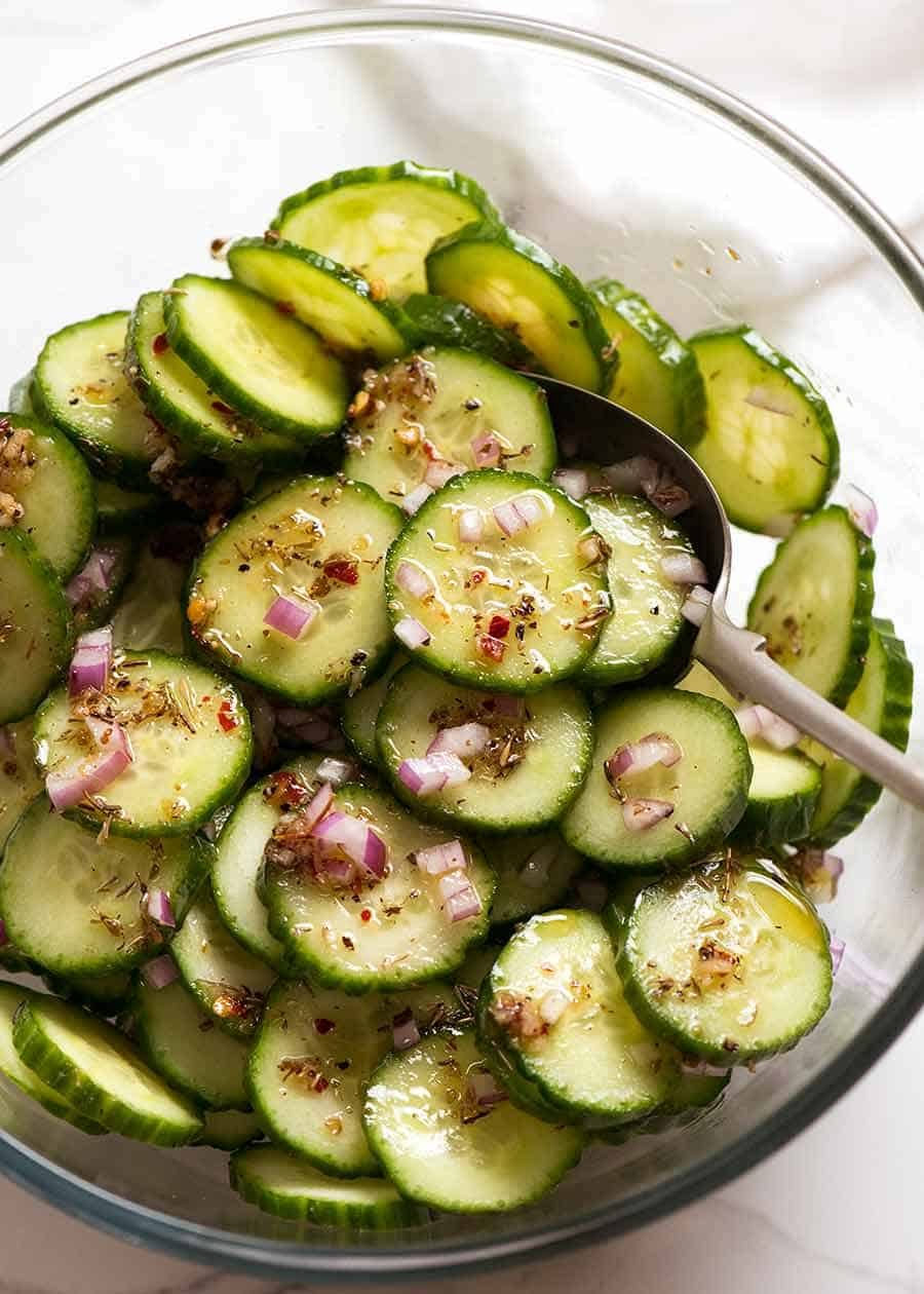 Cucumber Salad with Herb Garlic Vinaigrette Recipe Bowl of Cucumber Salad with Herb & Garlic Dressing