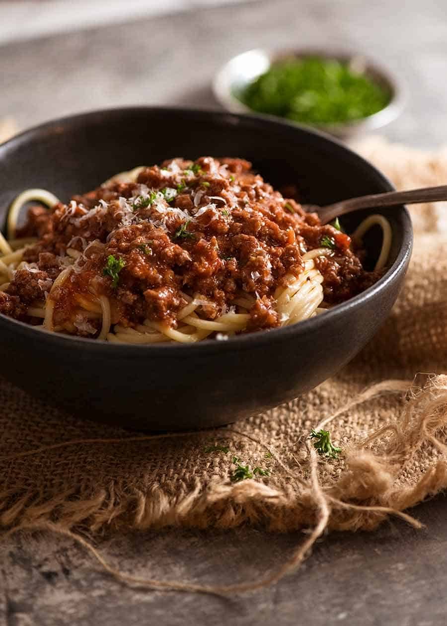Spaghetti Bolognese Recipe Meat sauce over spaghetti in a bowl, ready to be eaten