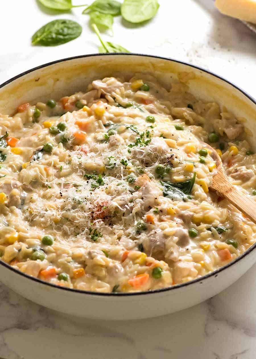 Quick Chicken & Vegetable Risoni recipe (Orzo) Recipe Creamy Chicken Vegetable Risoni in a white skillet, fresh off the stove. Quick chicken dinner recipe!