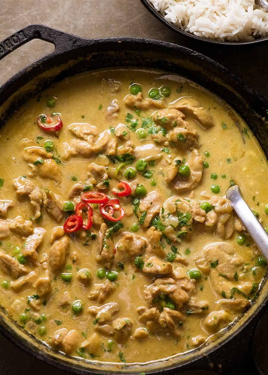 Chicken Curry Recipe Overhead photo of Chicken Curry in a black skillet, fresh off the stove