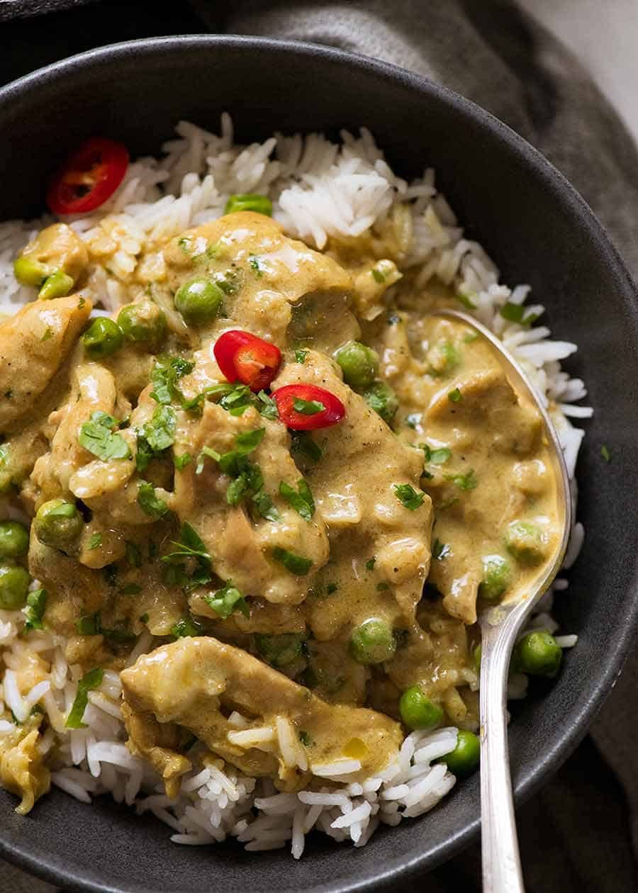 Chicken Curry Recipe Close up of simple Chicken Curry over rice, ready to be eaten