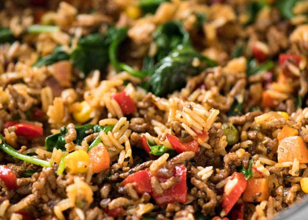 Beef and Rice with Veggies Recipe A quick, fabulous midweek meal - this ground Beef and Rice is made by browning ground beef, then cooking it with flavoured rice and loads of veggies. Irresistibly delicious! www.recipetineats.com