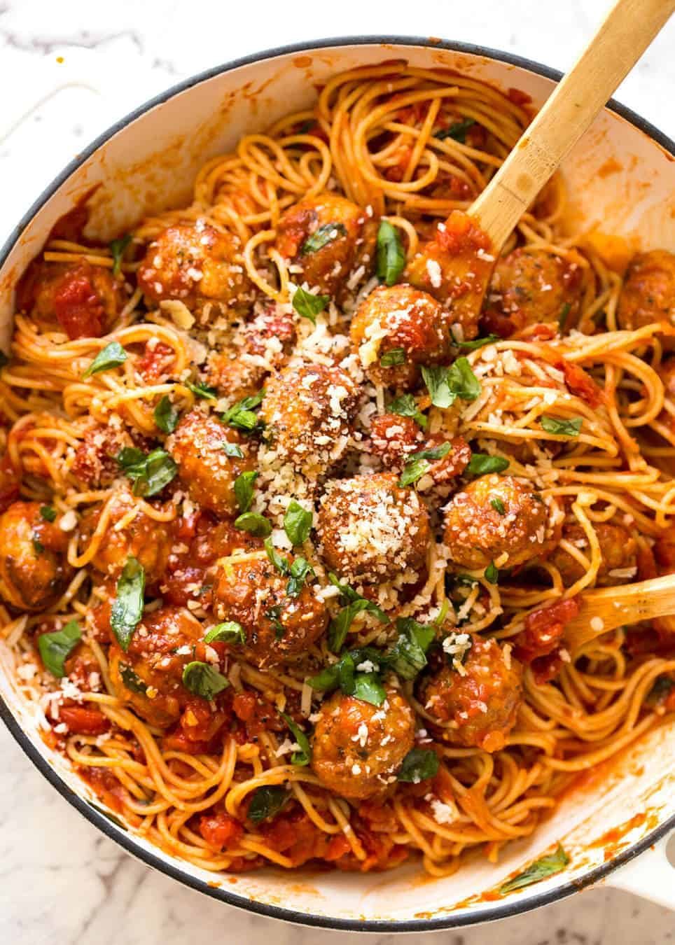 Baked Chicken Meatballs and Spaghetti Recipe Plump, juicy BAKED Chicken Meatballs and Spaghetti! They come out golden brown on the outside, and so soft and juicy on the inside. recipetineats.com
