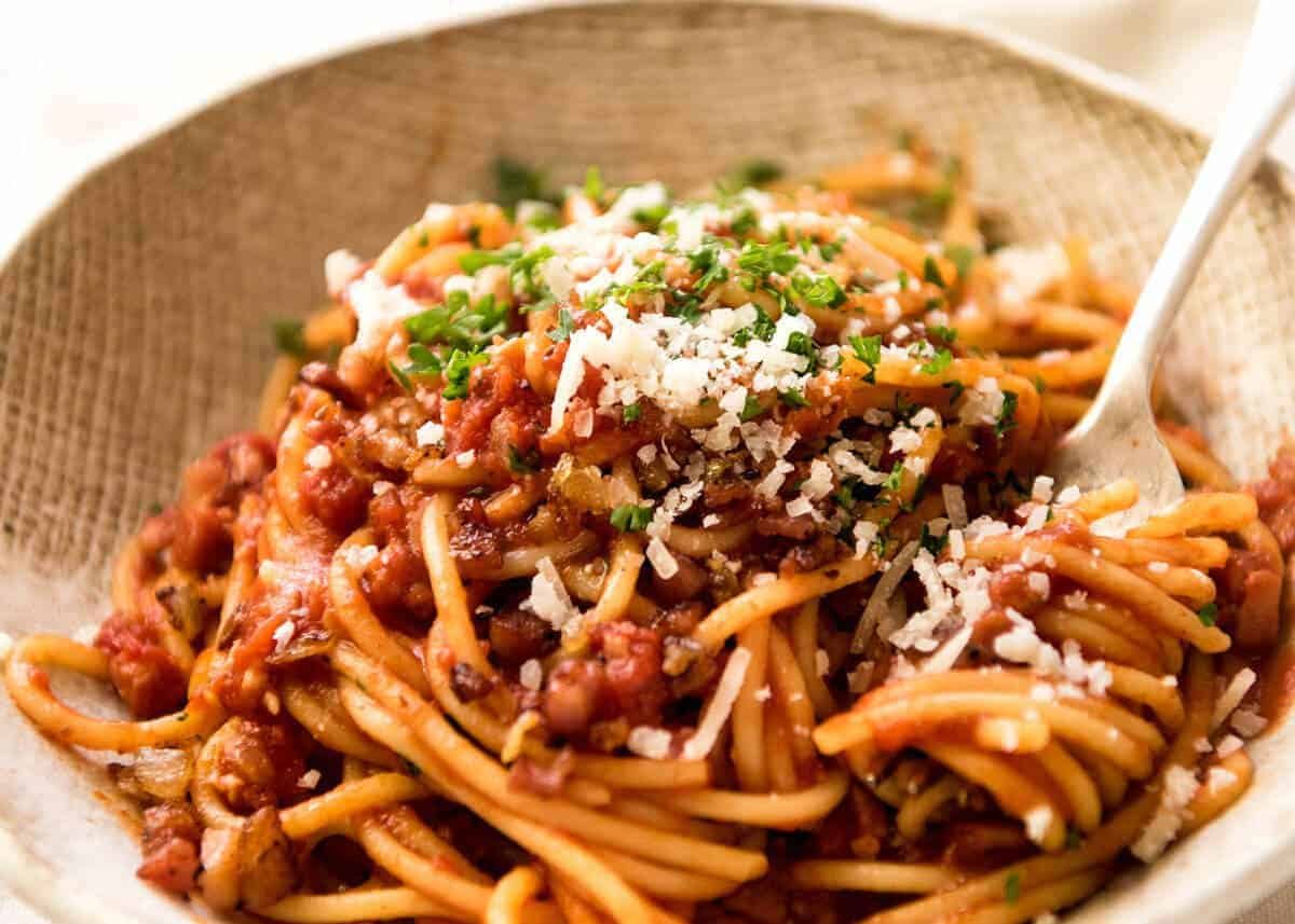 Tomato Bacon Pasta Recipe Simplicity at its best - Bacon Tomato Pasta. 5 ingredients. Utterly irresistible. recipetineats.com