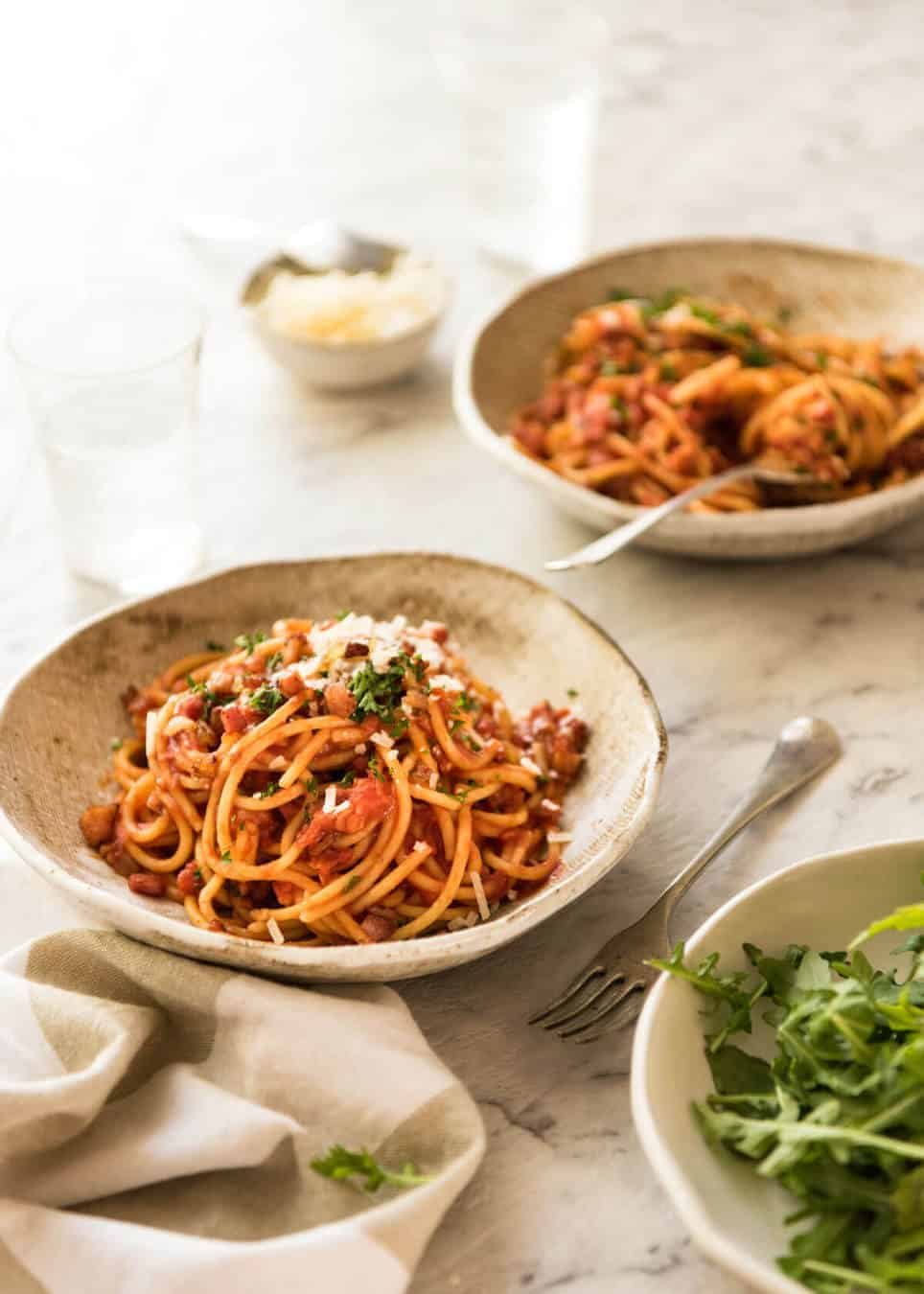 Tomato Bacon Pasta Recipe Simplicity at its best - Bacon Tomato Pasta. 5 ingredients. Utterly irresistible. recipetineats.com