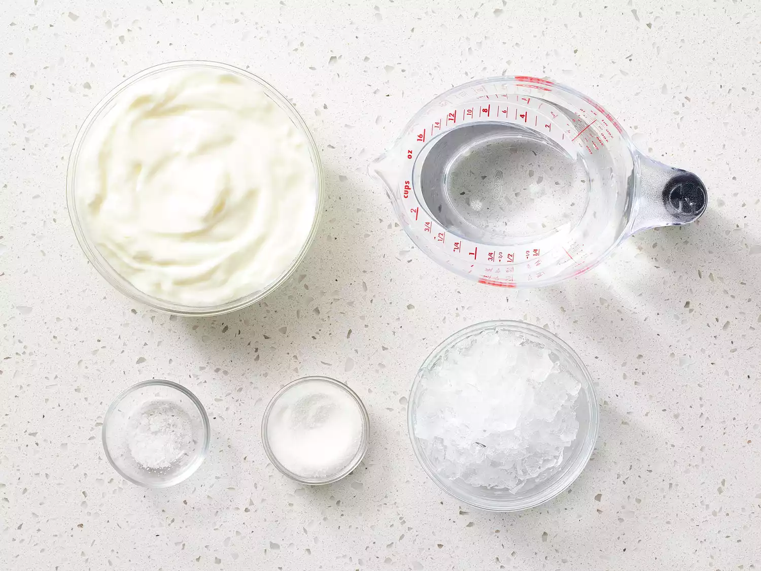 Indian Lassi recipe ingredients on a counter 