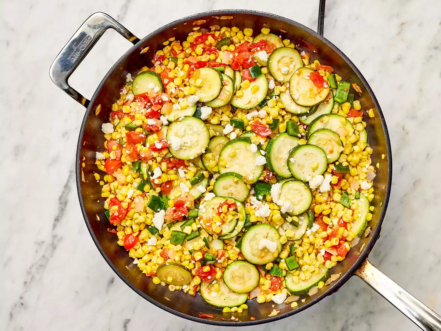 Calabacitas con Elote (Zucchini with Corn) in a pan
