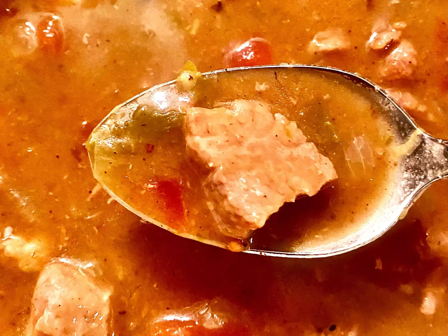 Close up of green chili on spoon