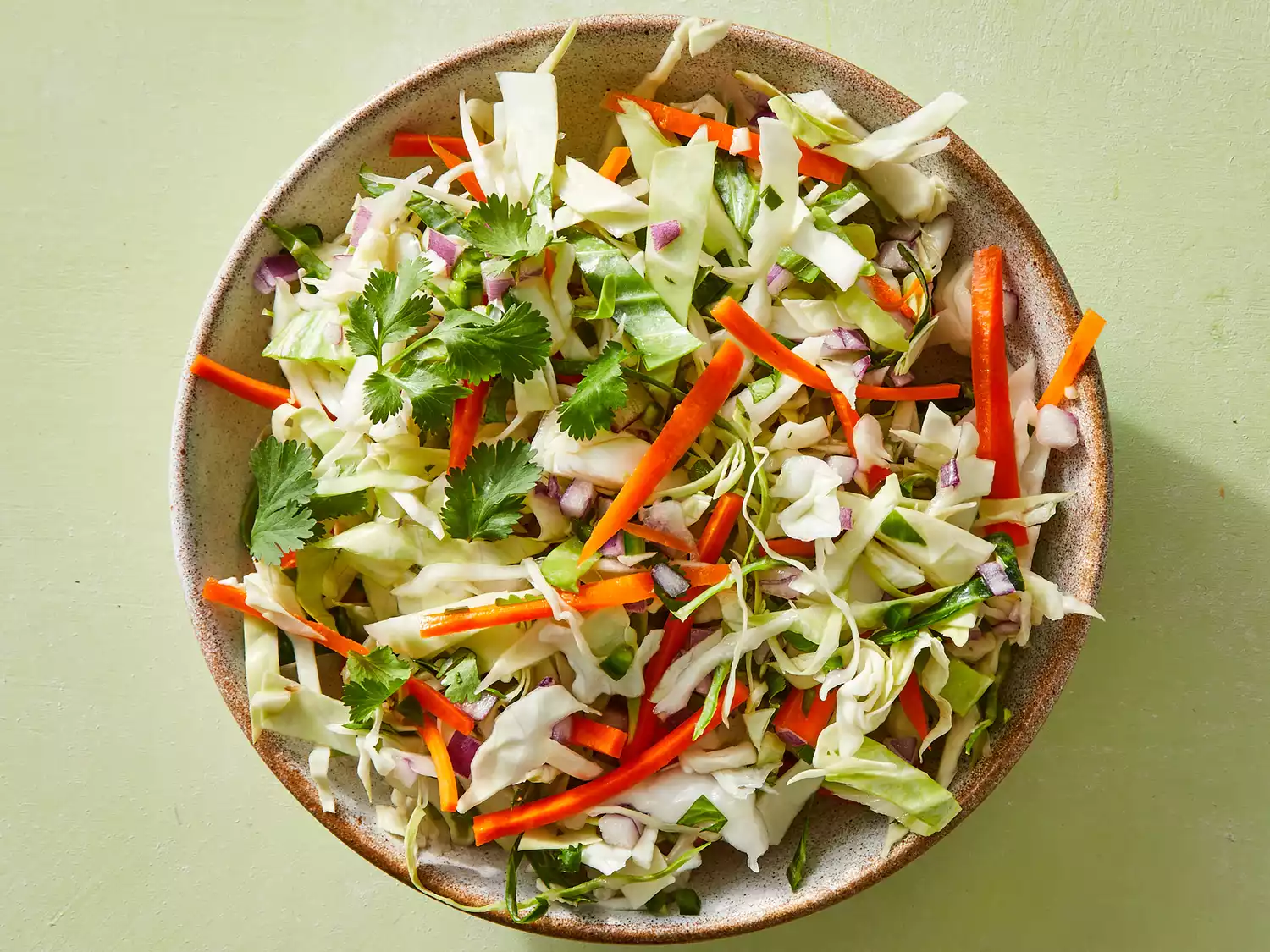 Looking down at a large bowl of taco slaw