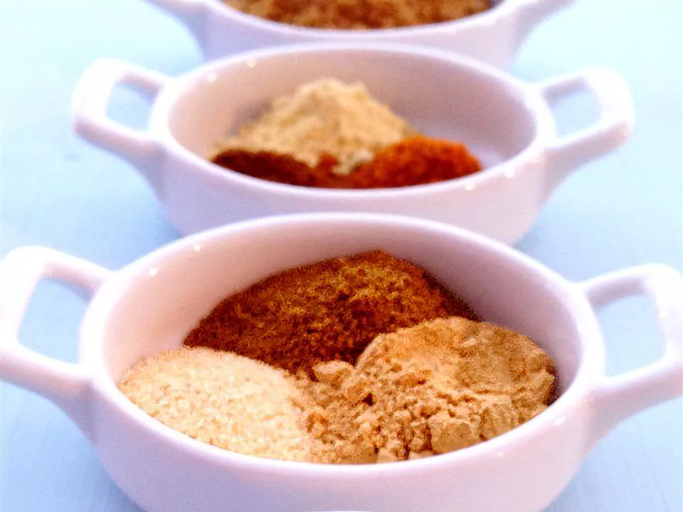Close up view of tandoori masala spice mix in bowls