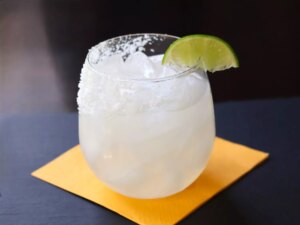 Classic margarita with lime wedge