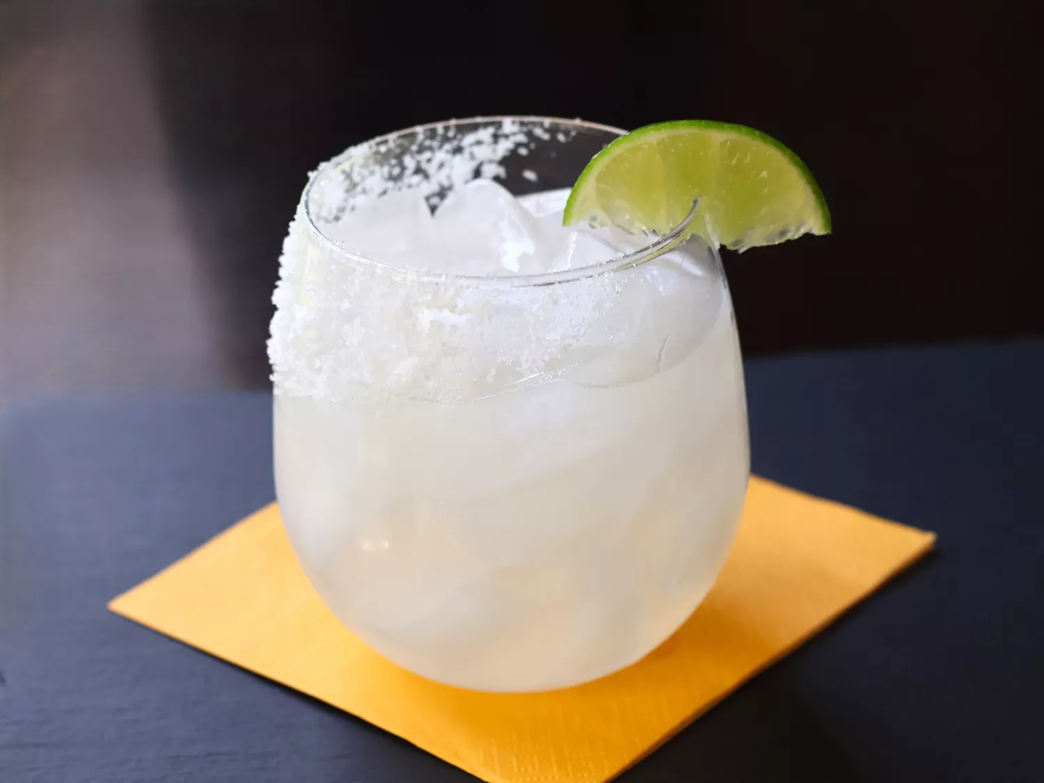 Classic margarita with lime wedge