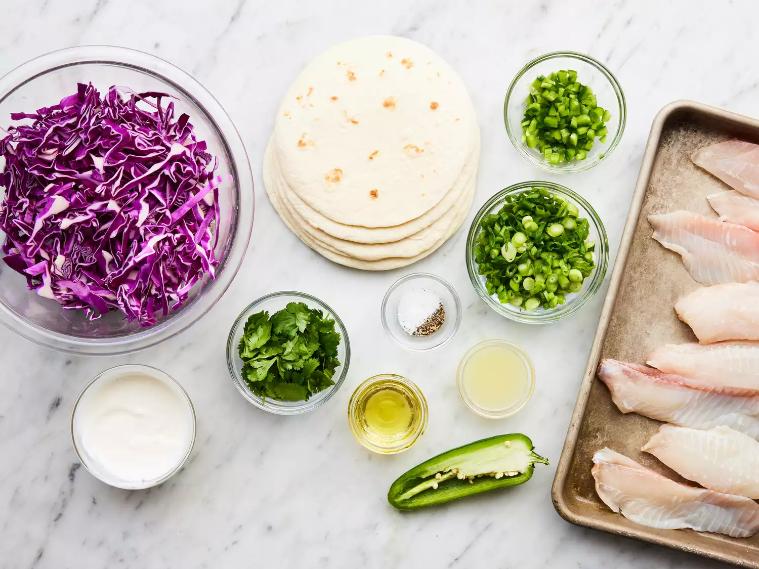 all ingredients gathered to make fish tacos