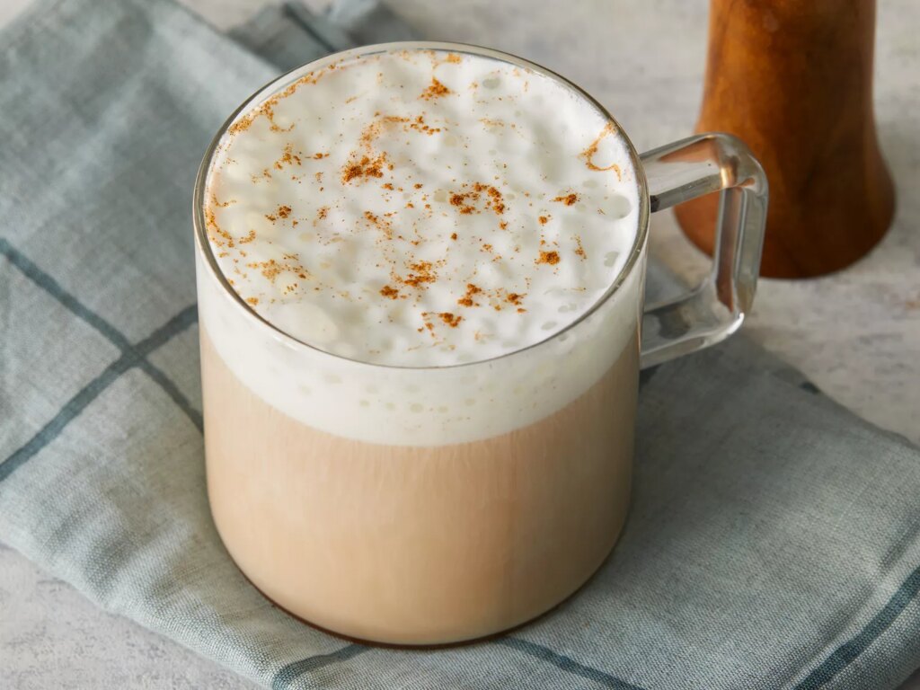 Close up on a glass mug of chai tea latte