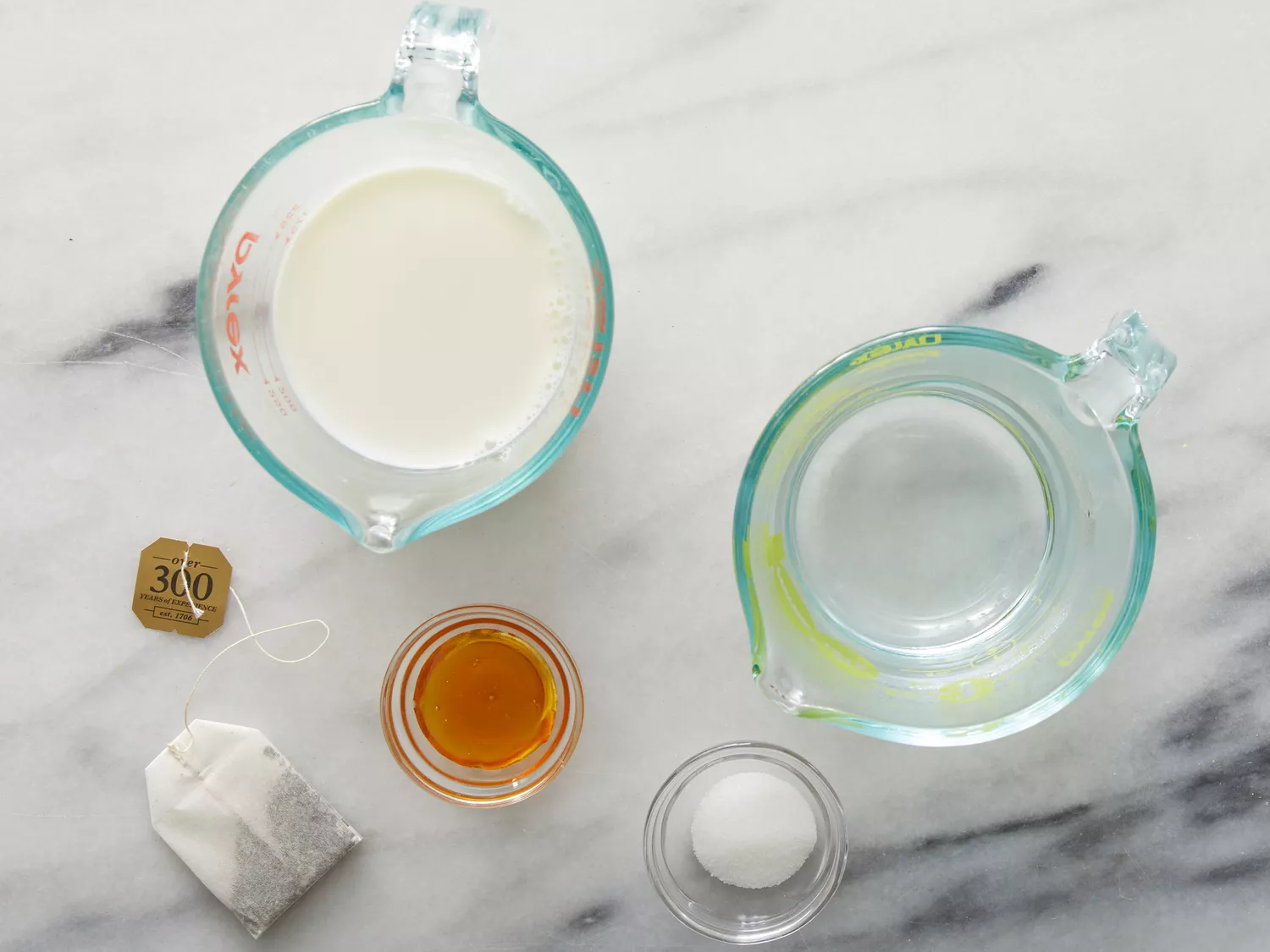 an overhead shot of all ingredients for chai tea latte