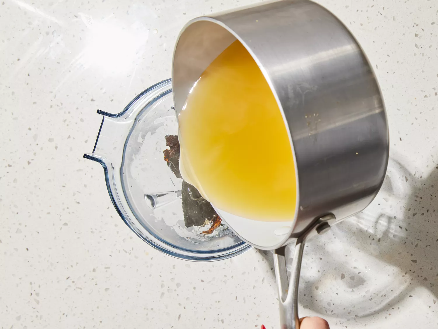  broth warmed and poured into blender