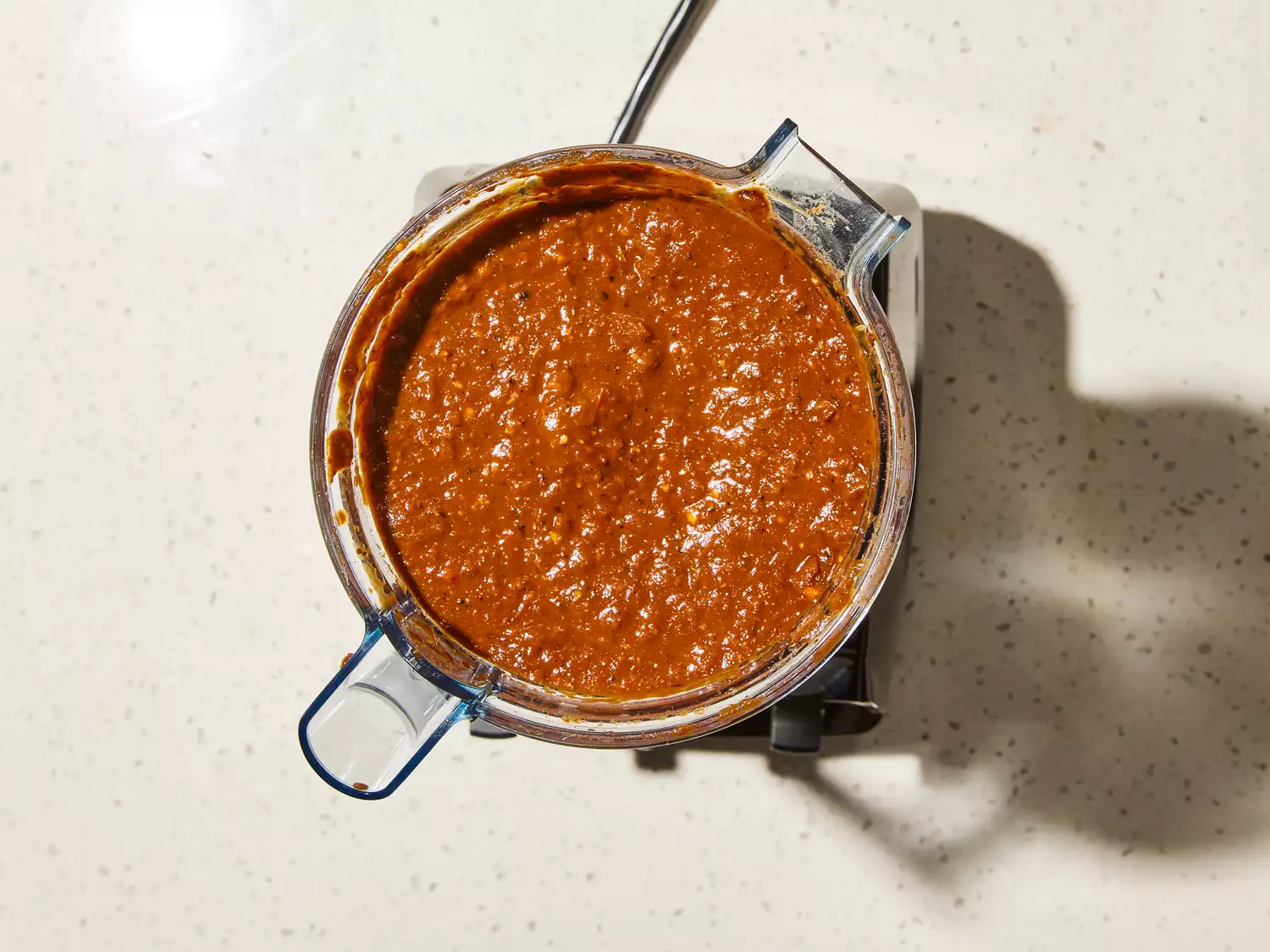 mixture added to blender with chile-tomato mixture 