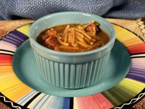 Mexican spaghetti in sauce with sausage