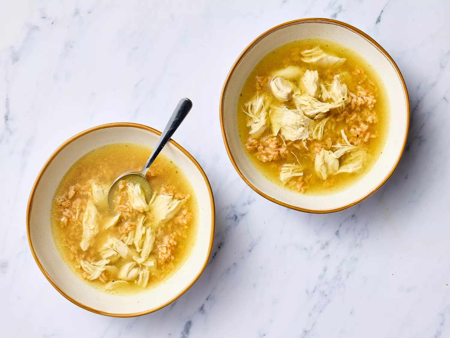 caldo de pollo served in bowls