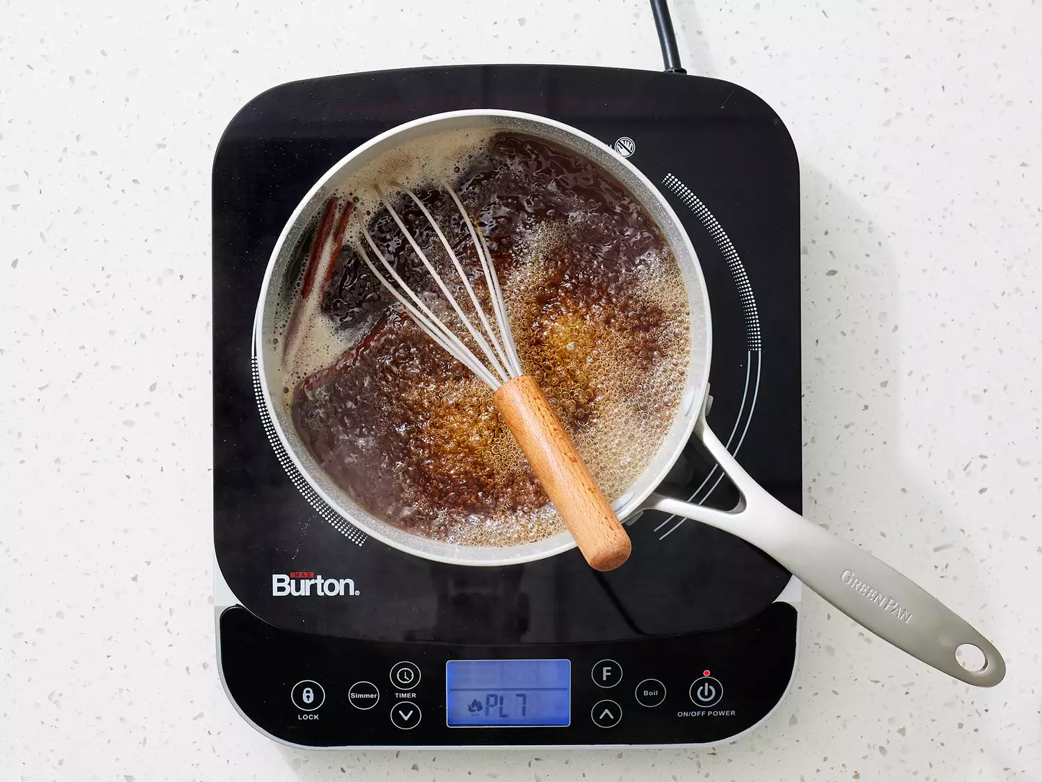 brown sugar, water, cinnamon coming to a boil in a small sauce pan. 