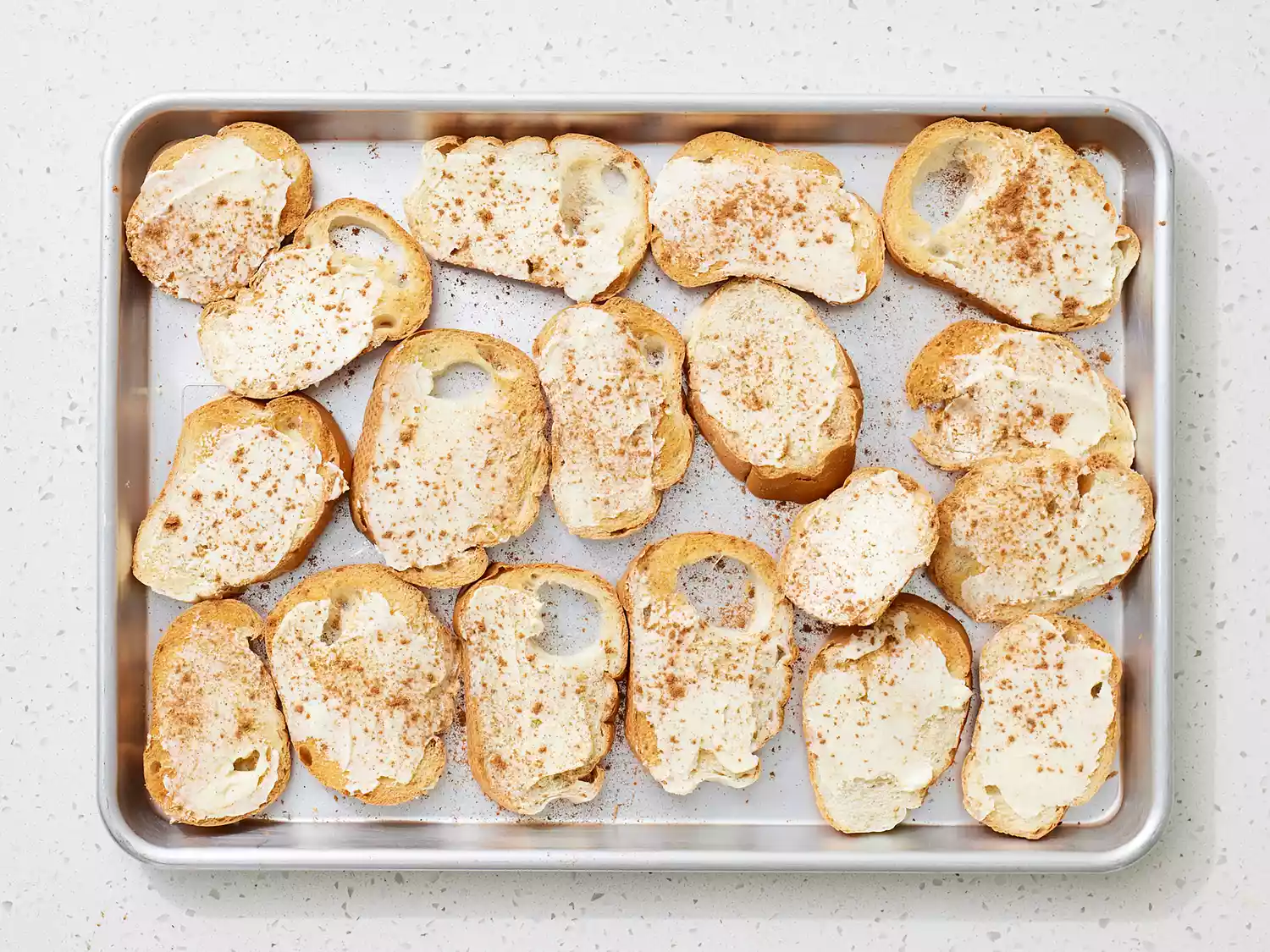 buttered bread sprinkled with seasoning.