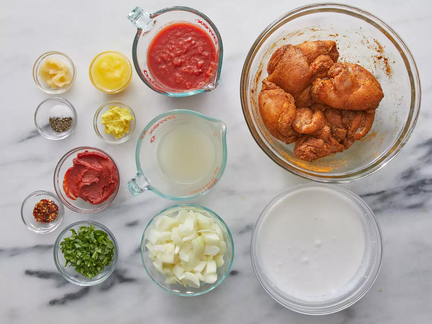 an overhead shot of all ingredients for Chef John's Chicken Tikka Masala