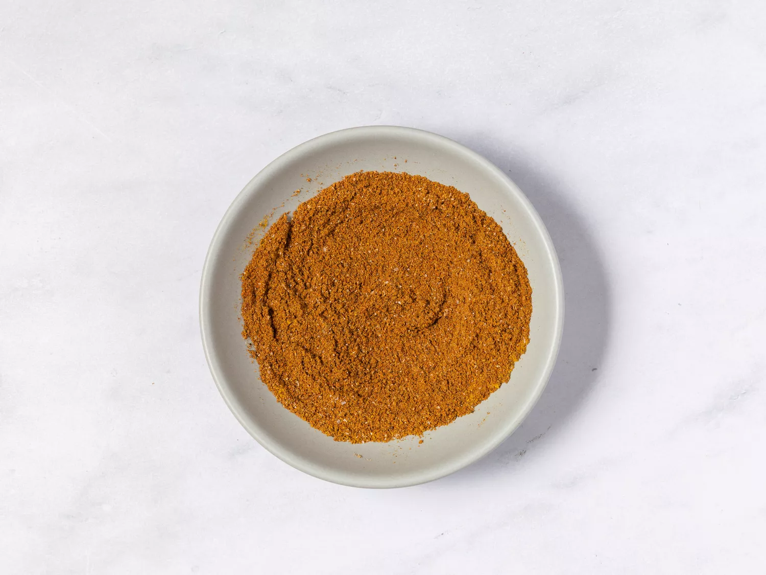 Small bowl of ground spice blend