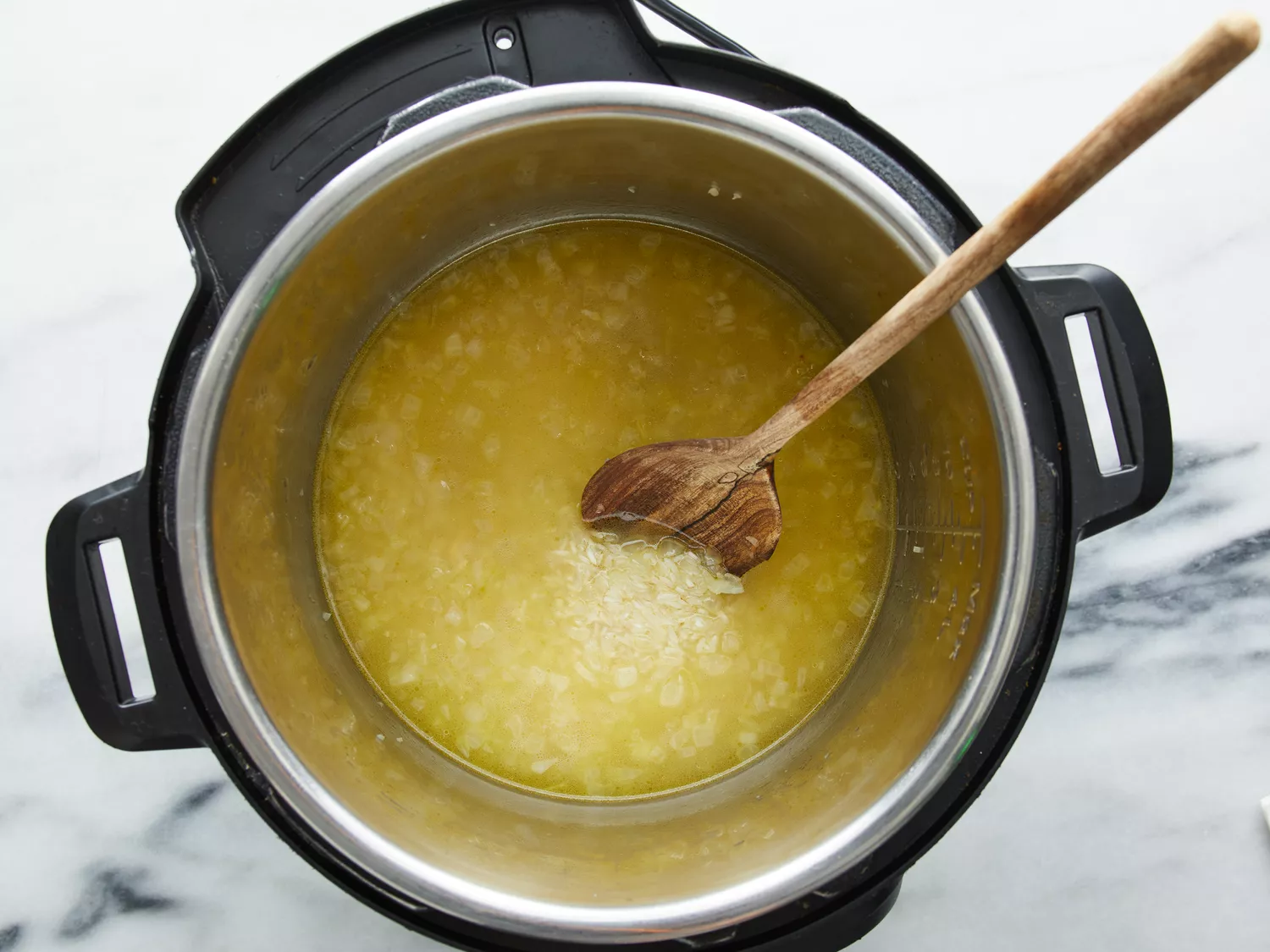 chicken stock added to an instant pot