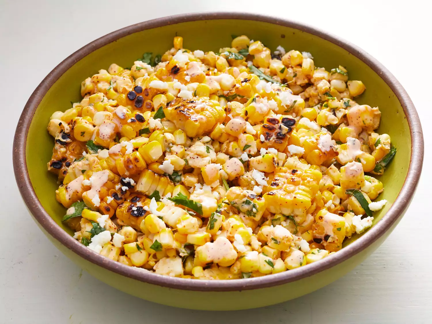 Elote salad in a large bowl