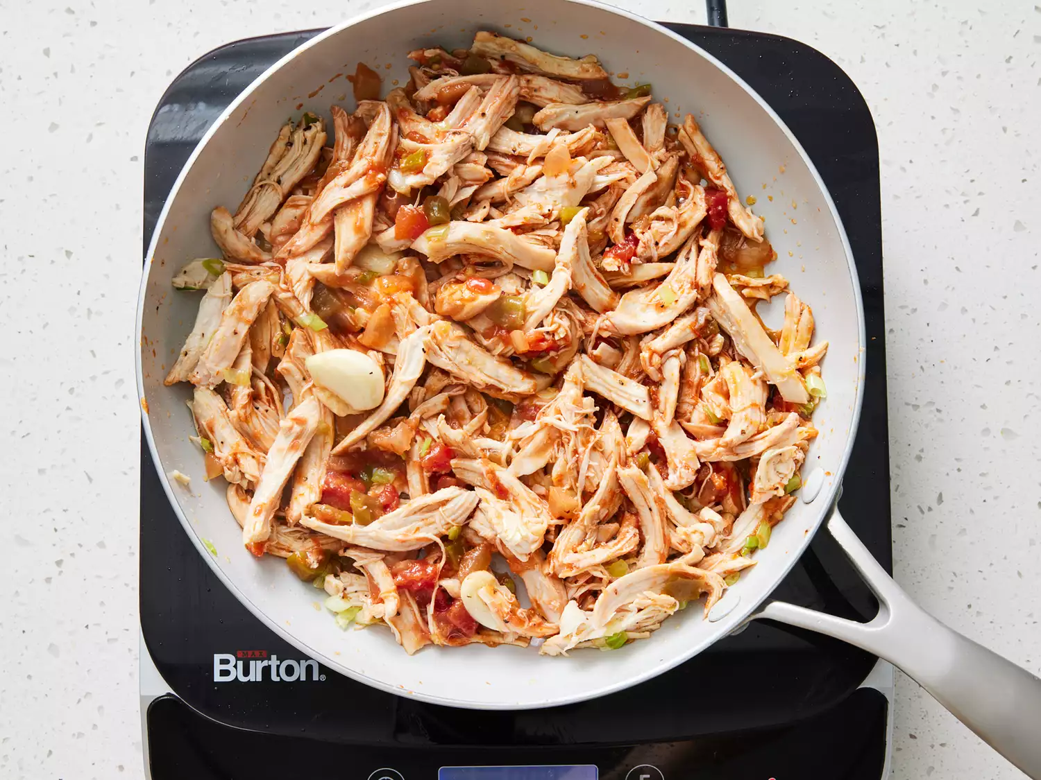 chicken, salsa, and seasonings added to pan