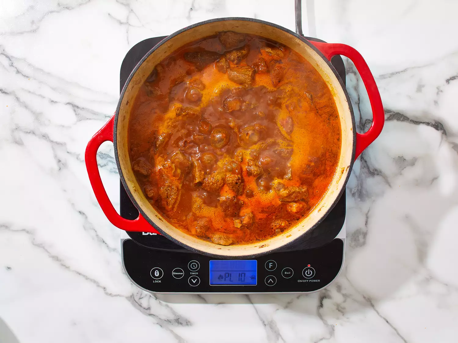 Rest of ingredients added to pot, simmering until beef is tender.