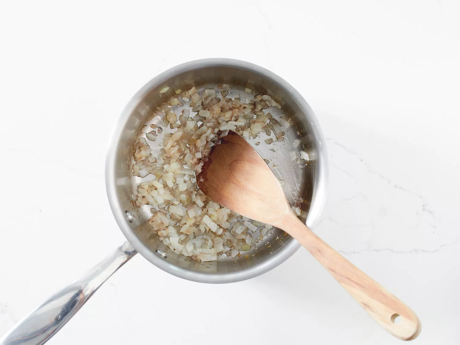 Shallot and onion mixture in saucepan.