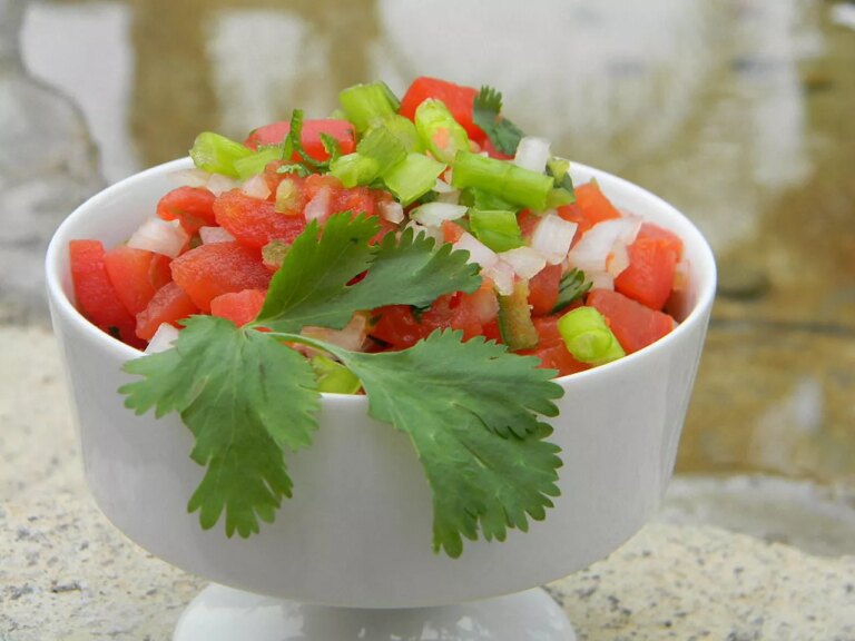 White bowl of tomato chutney