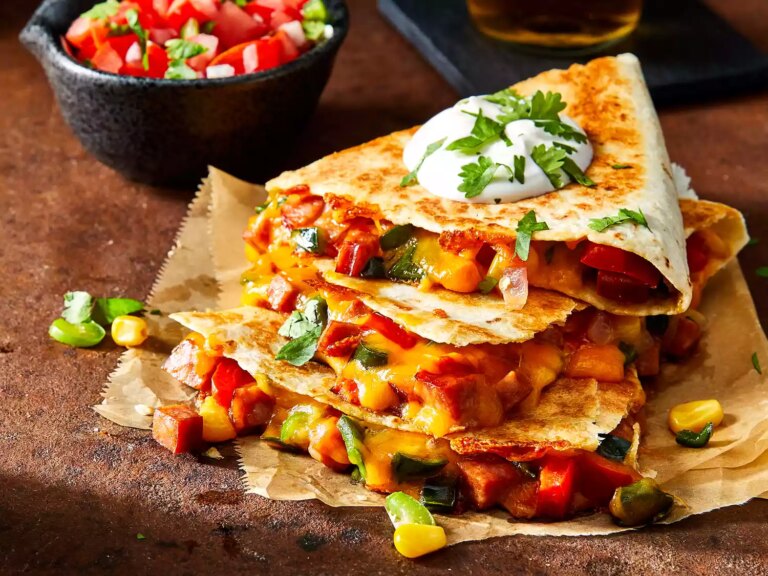 Mid angle looking at a few andouille and poblano quesadillas