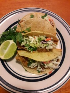 Spicy fish tacos with fresh lime sauce