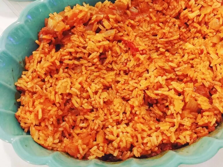 Close up view of simple mexican rice in a blue plate